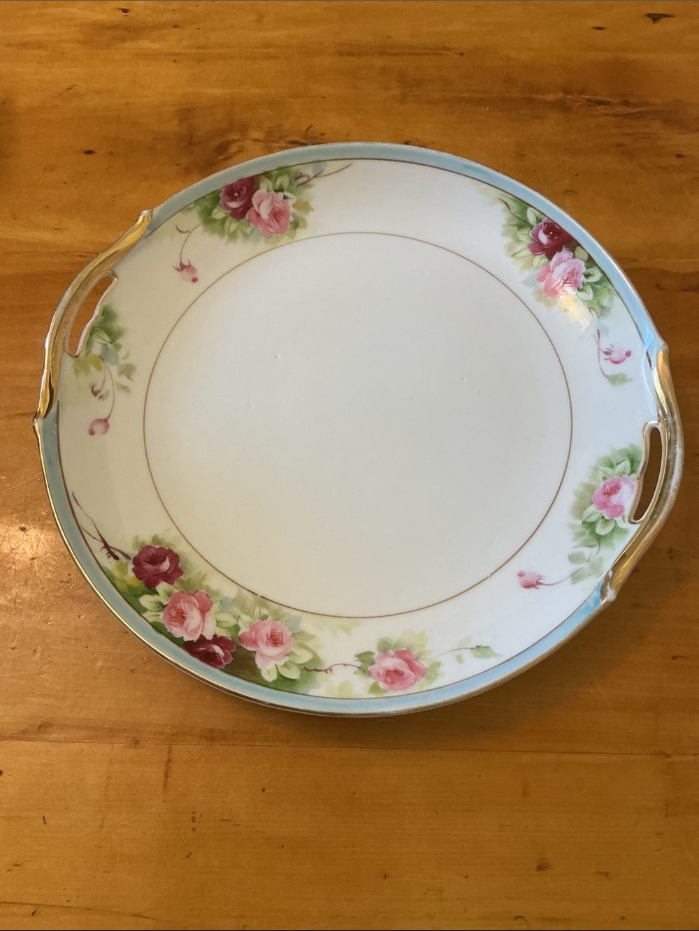 Vintage Porcelain Cake delicate blue border, cluster pink roses gilded open hand